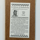 Close up of the Certificate of Authenticity and Artist information. 
