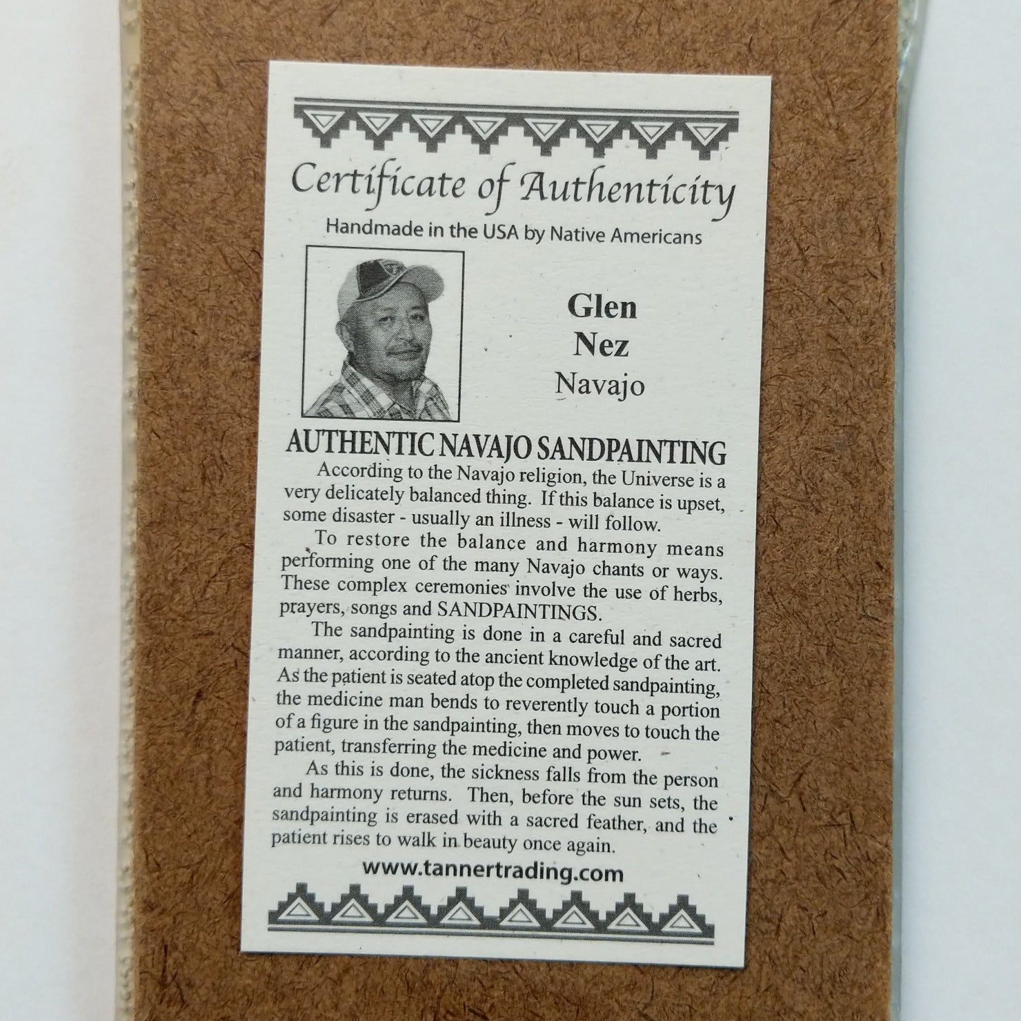 Close up of the Certificate of Authenticity and Artist information. 