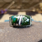 Sterling silver ring with inlay of Sonoran gold turquoise and white manmade opal set in the square bezel.