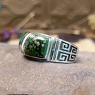 Sterling silver ring with inlay of Sonoran gold turquoise and white manmade opal set in the square bezel.