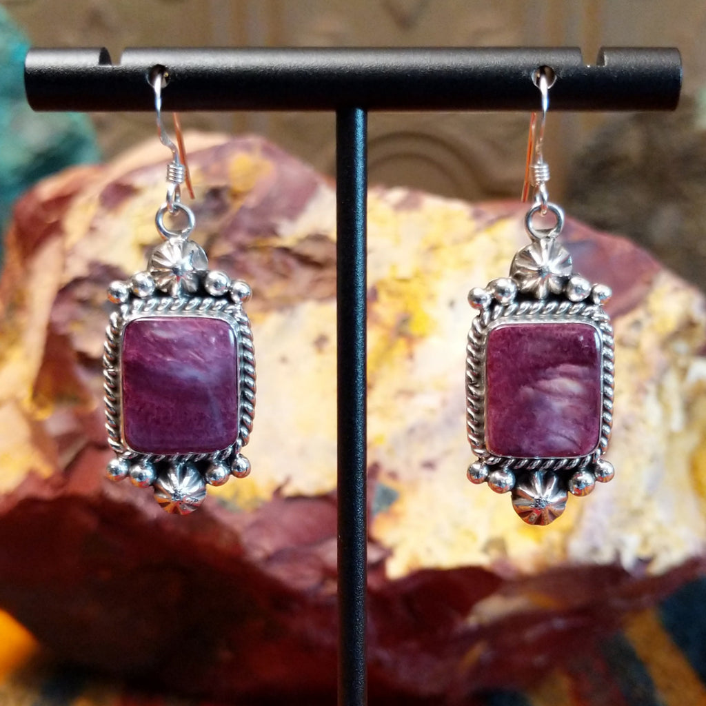 Purple spiny oyster shell set in sterling silver with intricate dot-work and twisted rope accents on the earrings.