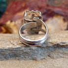Polished sterling silver layered band of the ring.