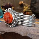5 row sterling silver cuff featuring spiny oyster shell set in a twisted rope bezel.
