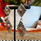 Double diamond setting earrings with red coral set in the bezels as the centerpiece.