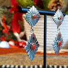 Double diamond setting earrings with red coral set in the bezels as the centerpiece.
