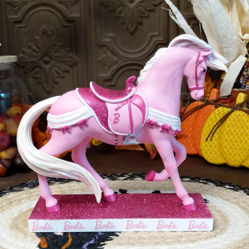 Resin pony painted in various pinks representing the Barbie addition.