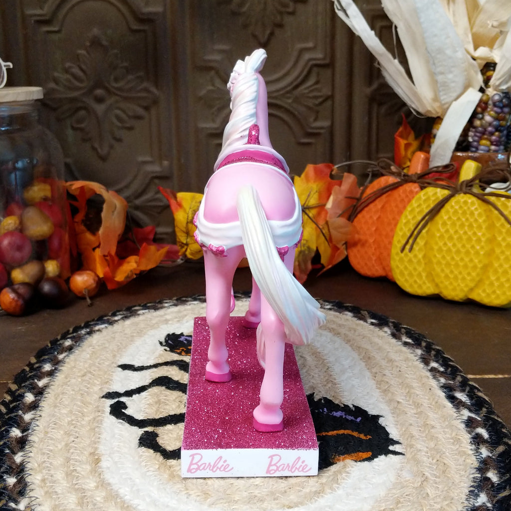 Resin pony painted in various pinks representing the Barbie addition.