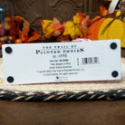 The underside of the base contains information about the piece.