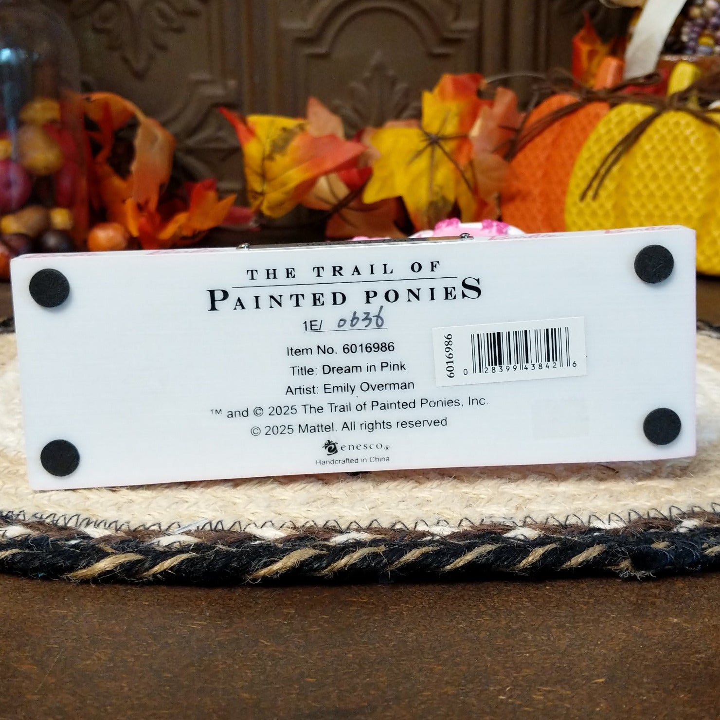 The underside of the base contains information about the piece.
