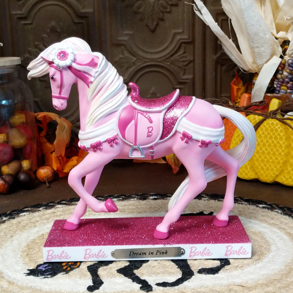 Resin pony painted in various pinks representing the Barbie addition.