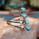 Sterling silver double strand ring with Dry Creek turquoise in oval bezels. 