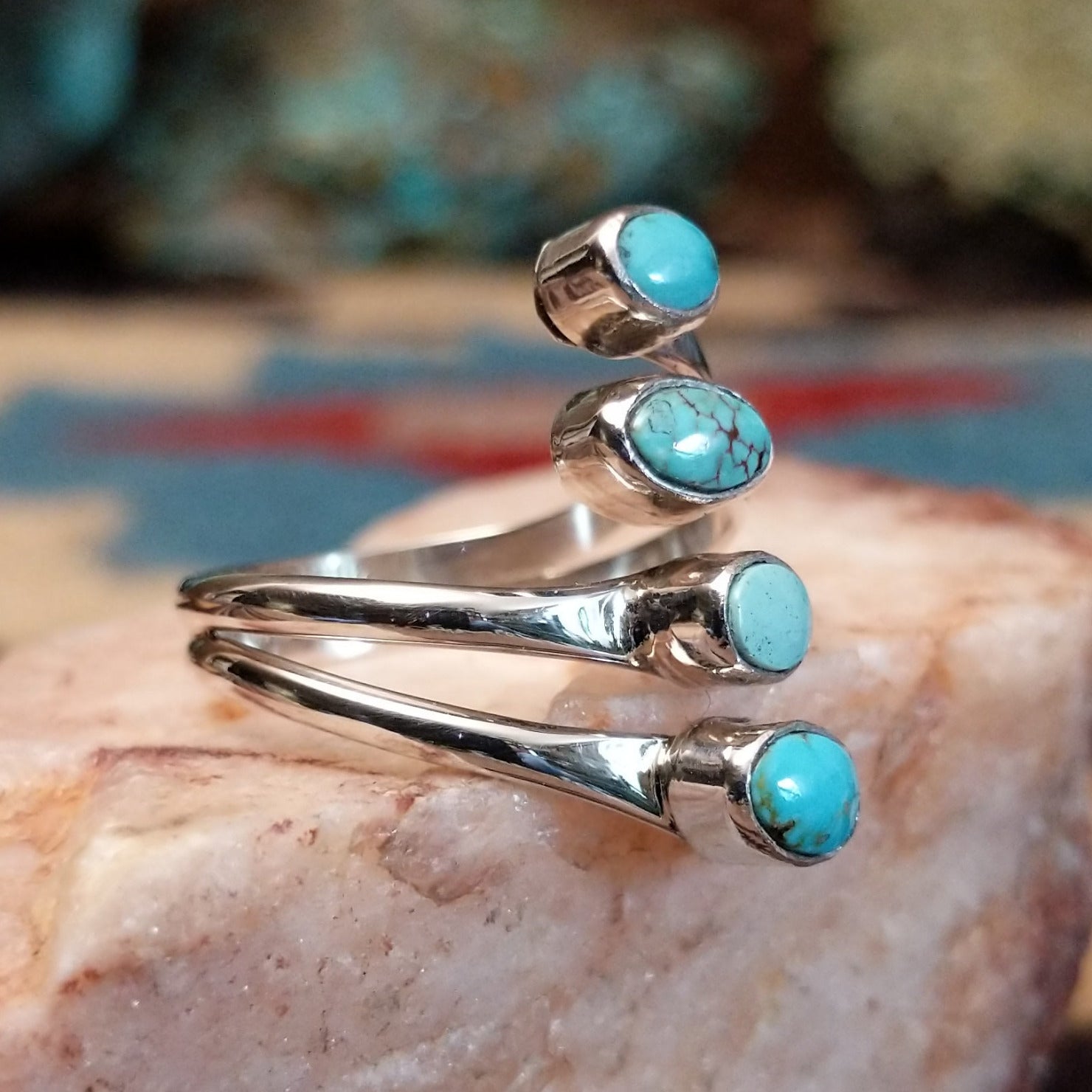 Sterling silver double strand ring with Dry Creek turquoise in oval bezels. 