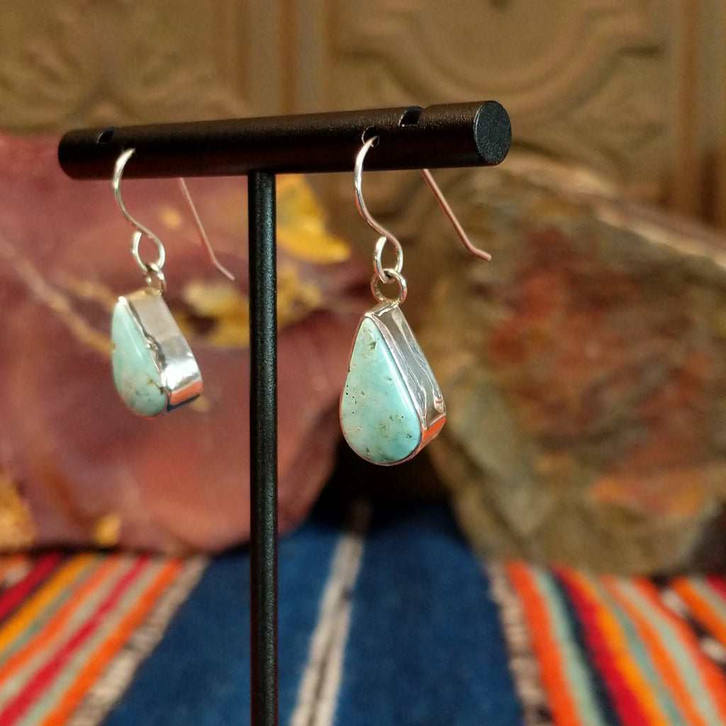 Dry Creek turquoise set tear drop shaped sterling silver bezels.