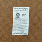 A close-up of the artisan's authentication tag.