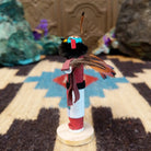 Mini eagle kachina by Rosalind Grey with turquoise face, black fur collar, feathered crest, and outstretched arms.