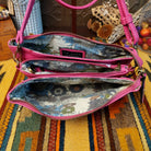 Ella Handbag by Liz Soto featuring a compact structured silhouette, textured exterior, dual handles, turn-lock accent, top zip closure, and rectangular Liz Soto logo plaque; interior view.