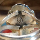 Close-up of the artisan's stamped signature.
