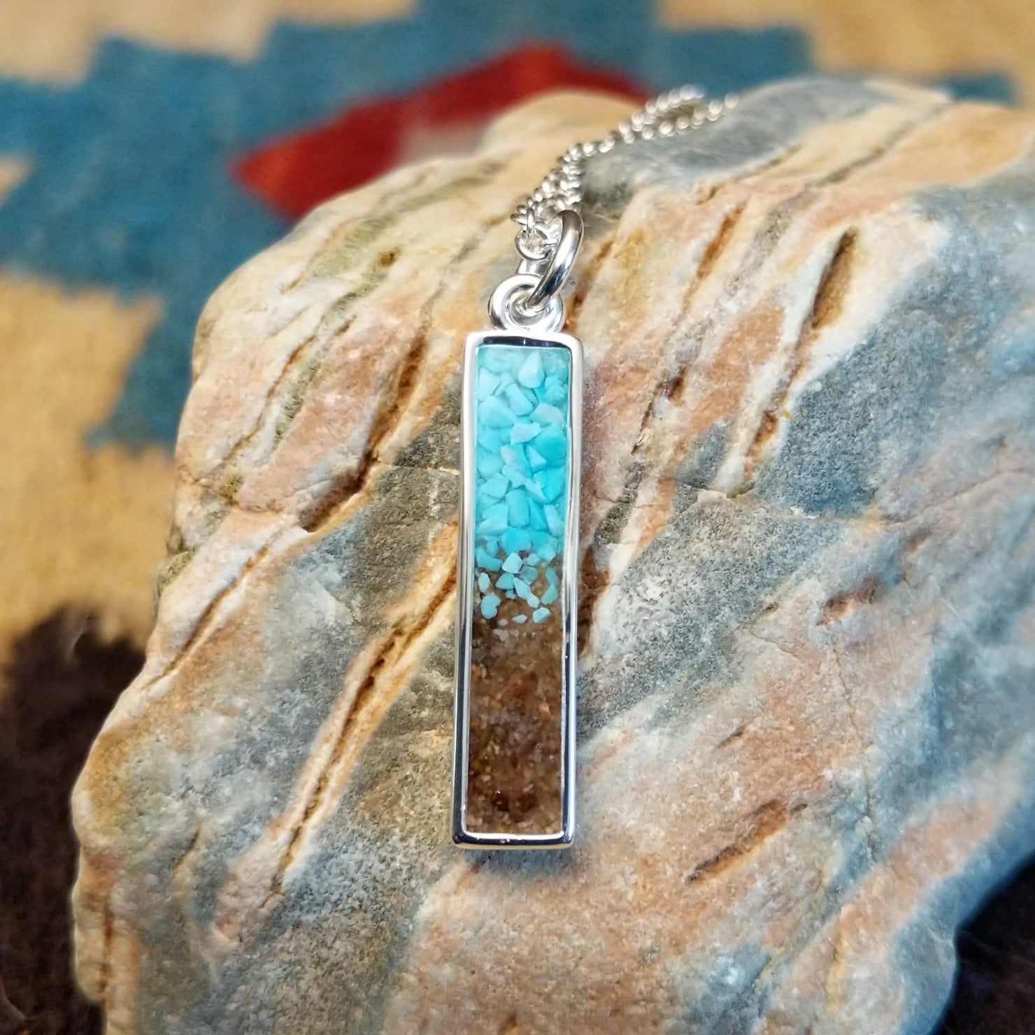 Silver-plated brass necklace with turquoise and San Pedro River sand set in the bar bezel.