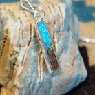 Silver-plated brass necklace with turquoise and San Pedro River sand set in the bar bezel.