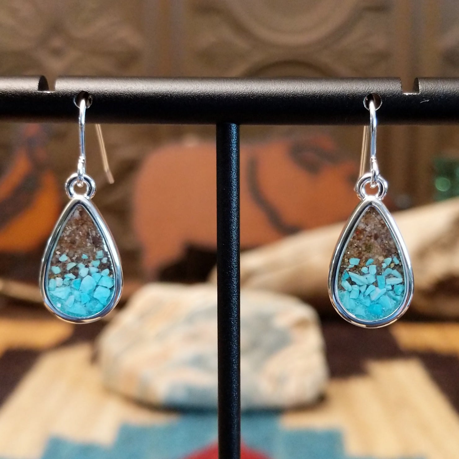Silver-plated brass earrings with turquoise and San Pedro River sand set in teardrop bezels.