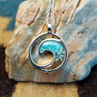 Silver-plated brass necklace with turquoise and San Pedro River sand set in the wave bezel.