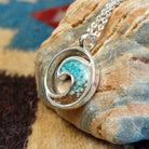 Silver-plated brass necklace with turquoise and San Pedro River sand set in the wave bezel.