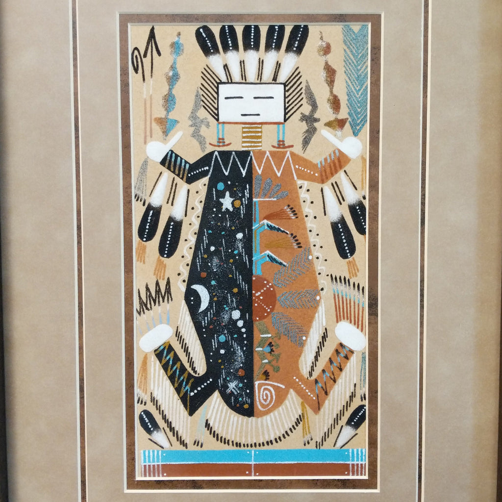 Close up of the colorful painting using sand to depict Father Sky and Mother Earth.