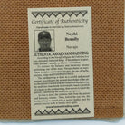 Close up of the Certificate of Authenticity and Artist information. 