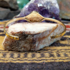Interior view of handcrafted cuff showing band thickness and fit.