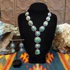 Necklace and earrings set with Sonoran Gold turquoise set in sterling silver bezels, framed by twisted rope and frilled-edge settings.