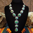 Necklace with Sonoran Gold turquoise set in sterling silver bezels, framed by twisted rope and frilled-edge settings.
