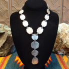 The back of the necklace features the smooth sterling silver settings.