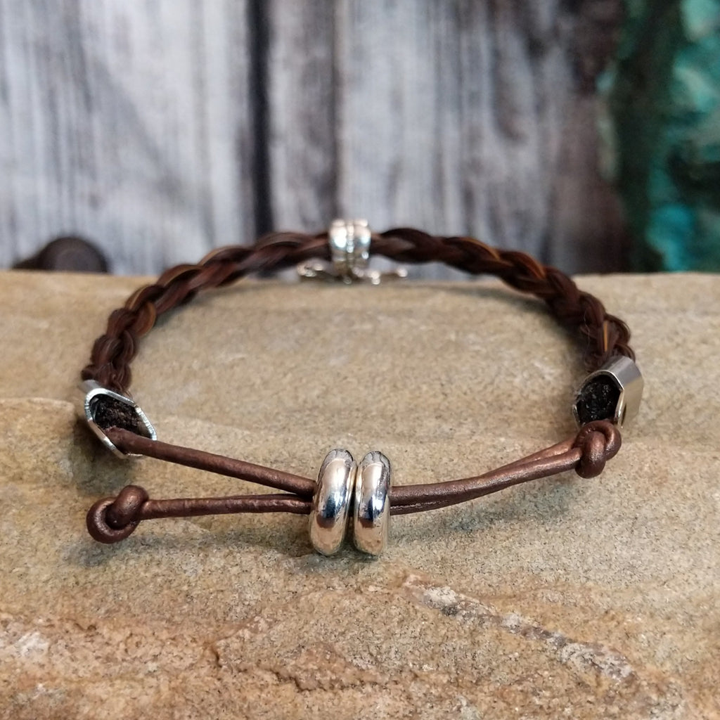 Close up of the bracelets adjustable cord.