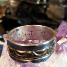 Sterling silver stamp etched into the inside of the ring.