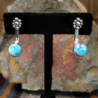 Golden Hills turquoise adjustable earrings with round Golden Hills turquoise stones and light brown matrix veining set in sterling silver with a smooth bezel, crafted by Navajo artist Terry Wood.