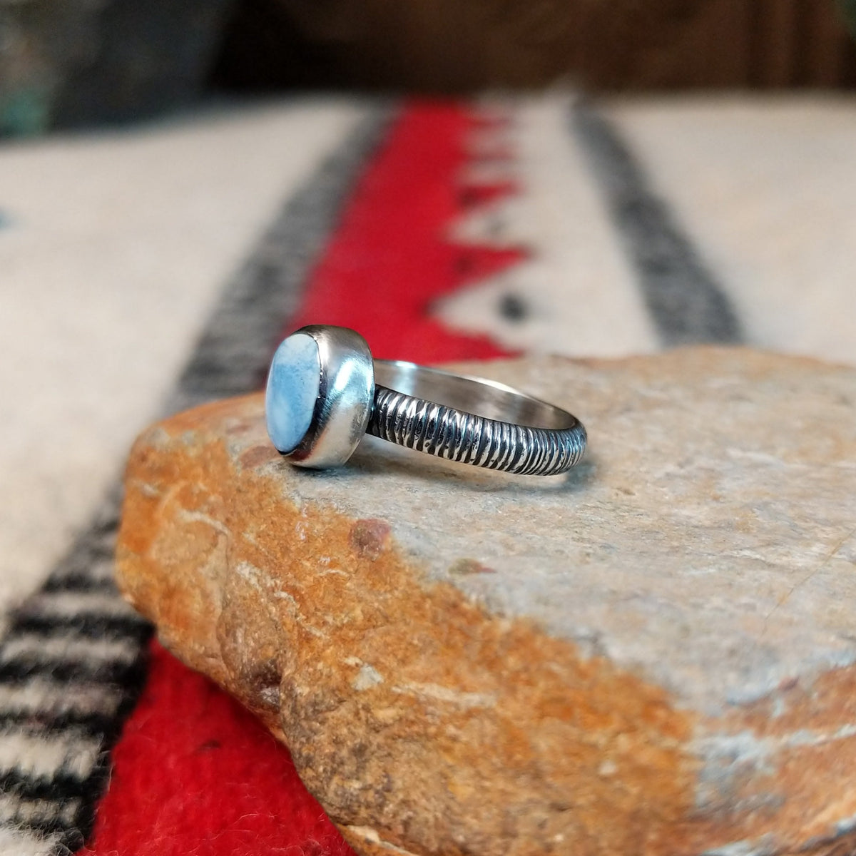 Golden Hills turquoise silver ring by Raymond Coriz with textured band.