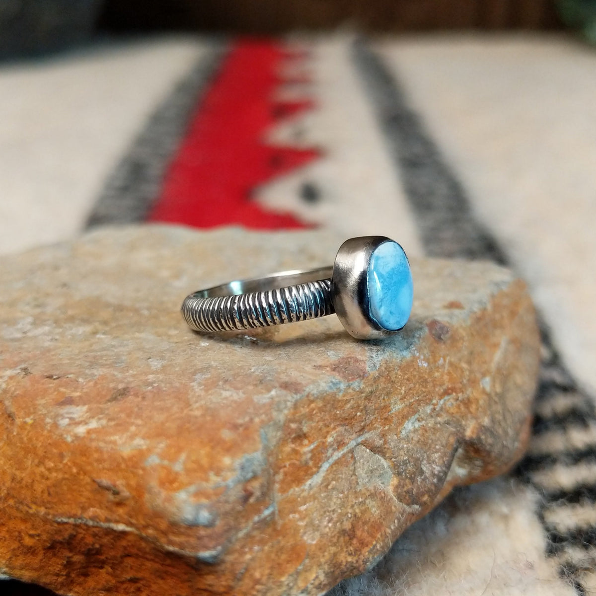 Golden Hills turquoise silver ring by Raymond Coriz with textured band.