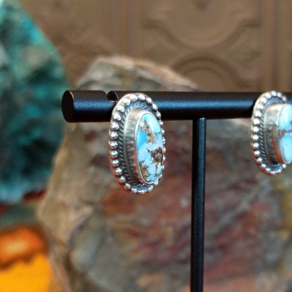 Golden Hills turquoise earrings with beaded bezel.