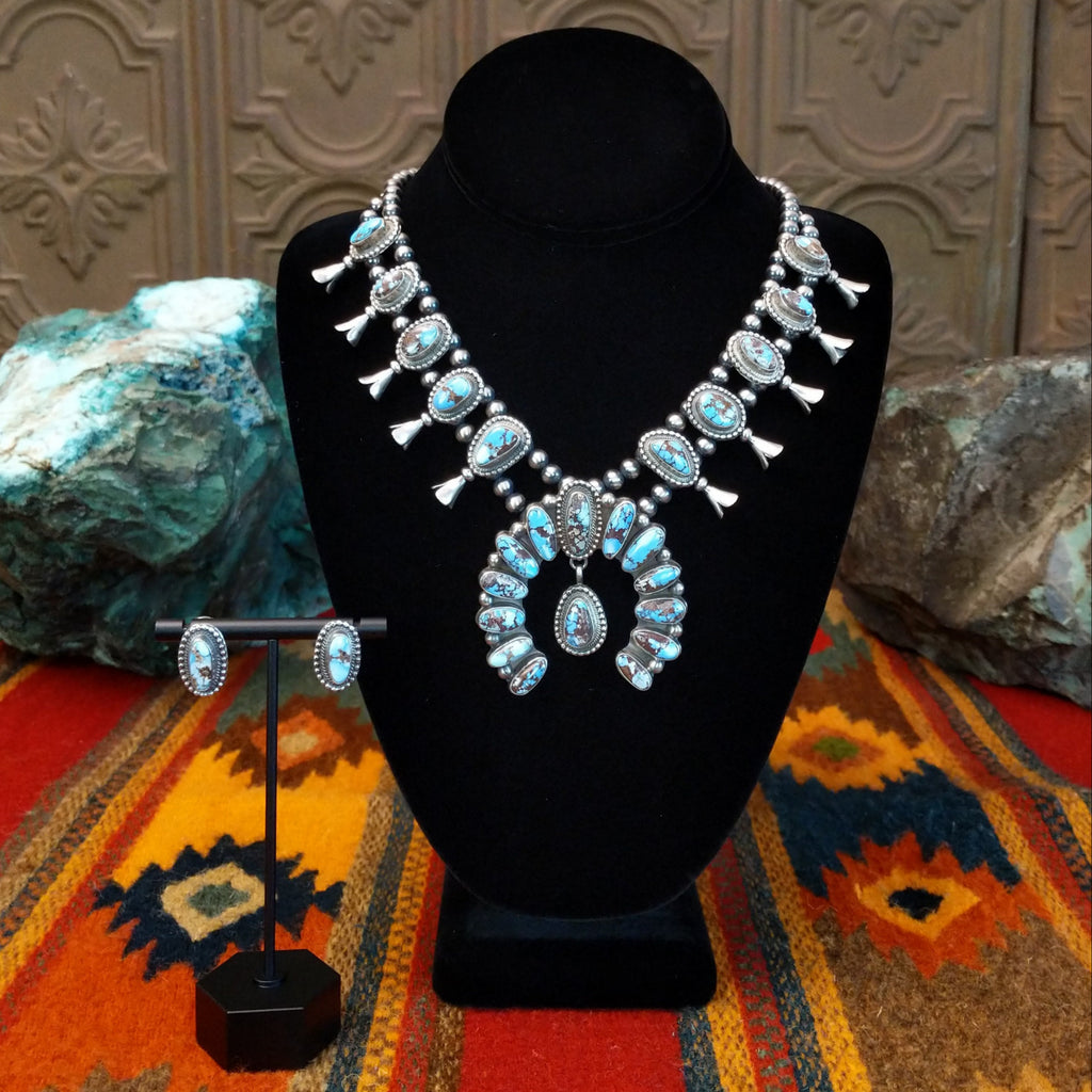 Golden Hills turquoise necklace with naja pendant and matching earrings.