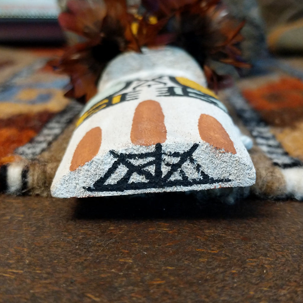 Signature is found on the bottom of the piece.