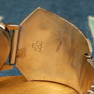 Close-up of the artisan's stamp.