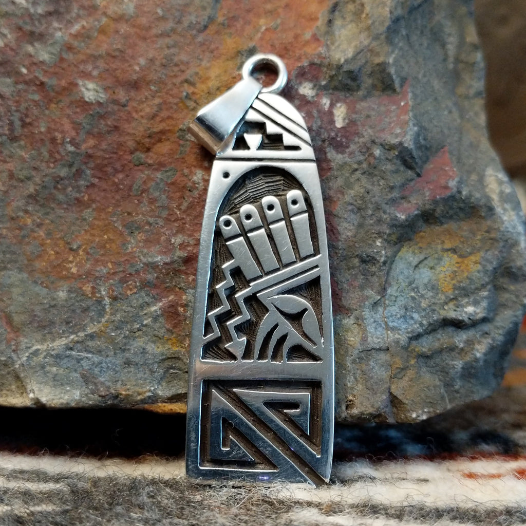Sterling silver pendant with Hopi lightning motif.