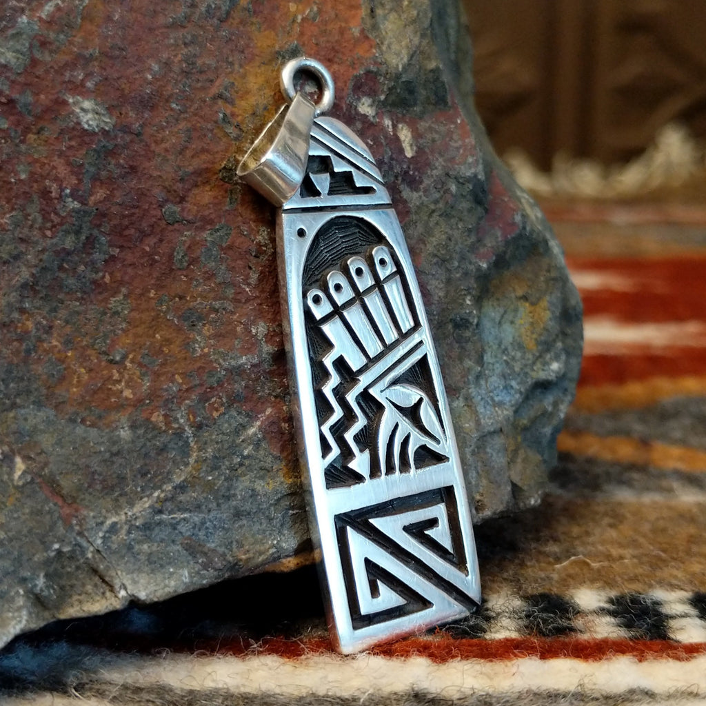 Sterling silver pendant with Hopi lightning motif.