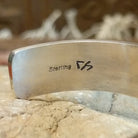 Close-up of the artisan's hallmark.