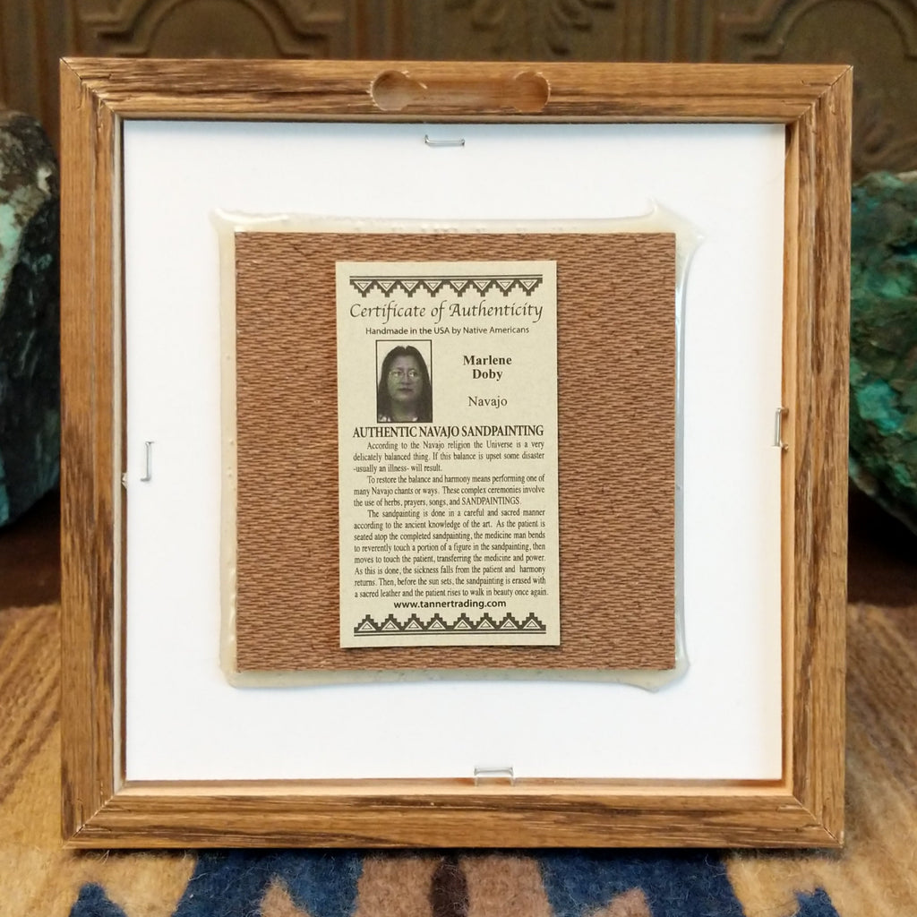 The back is simple with artisan's authentication.