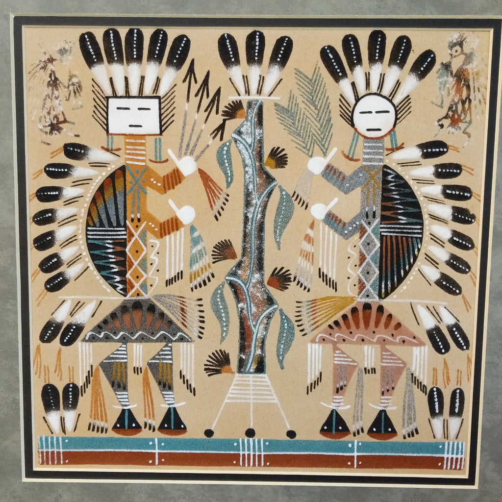 A close-up of the two Hump-backed Yei made from sand.