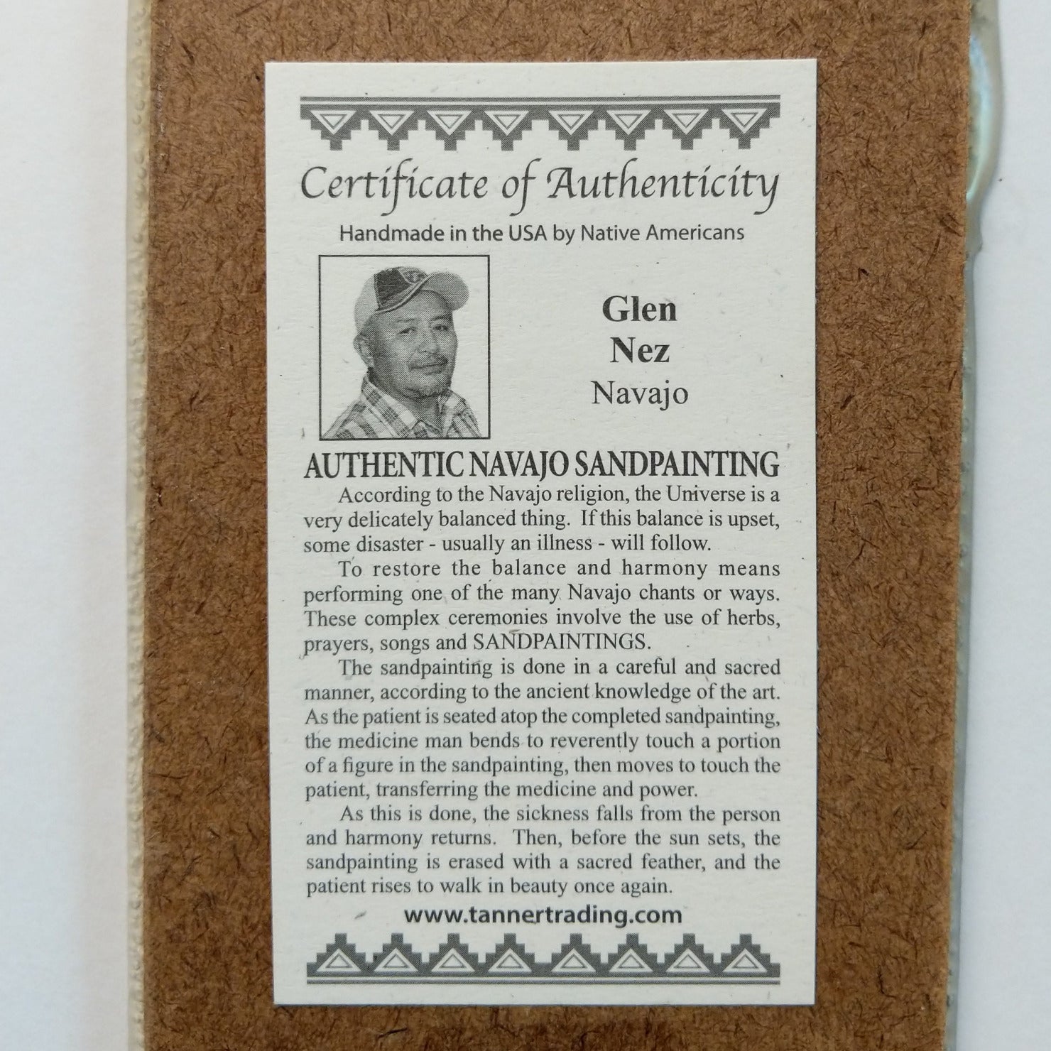 Close up of the Certificate of Authenticity and Artist information. 