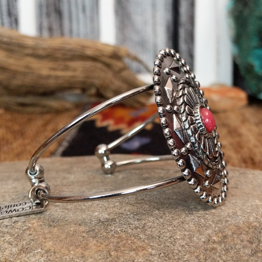 Nickel-free metal bracelet with a red stone center and thin dual band.