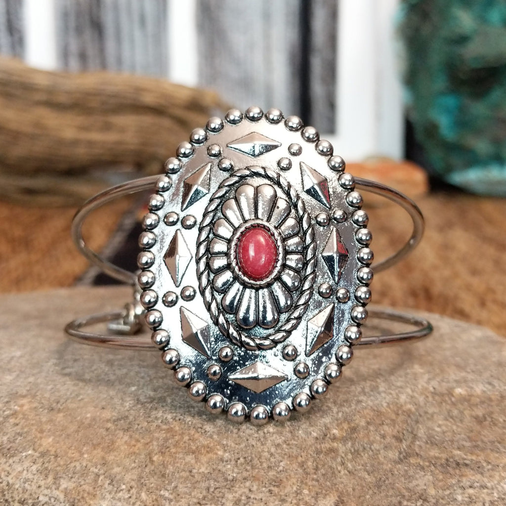 Nickel-free metal bracelet with a red stone center and intricate silver beaded and diamond accents.
