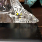 A frosted Lucite sculpture of a bald eagle with a hand-painted bald eagle soaring through the clear crystal interior; production number.
